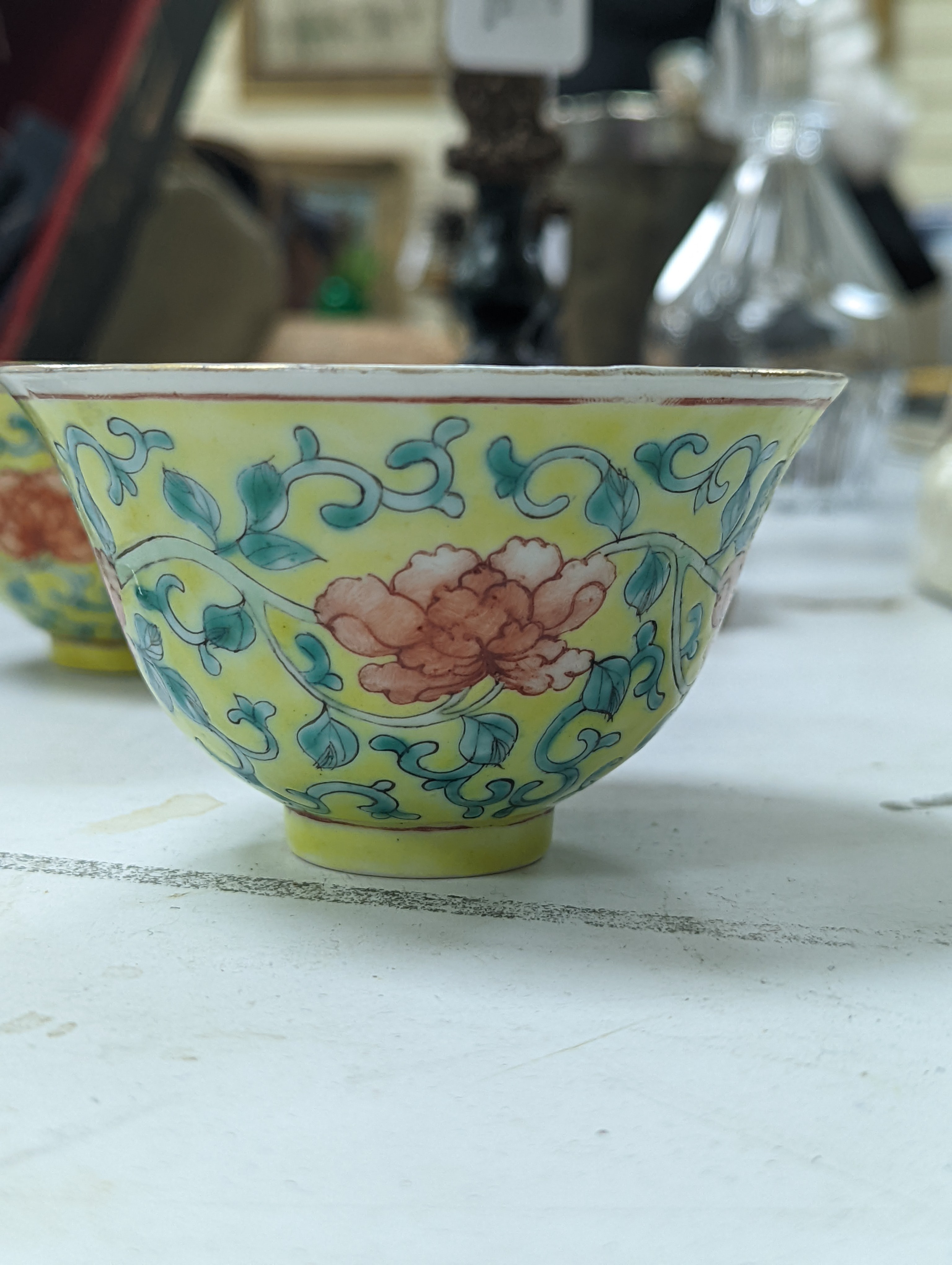 A group of Chinese porcelain, 19th /20th century, to include a pair of yellow ground bowls, 10.8 cm diameter, a blue and white vase, Xuande mark, a similar bowl and vase, and a champleve enamel bronze koro and cover